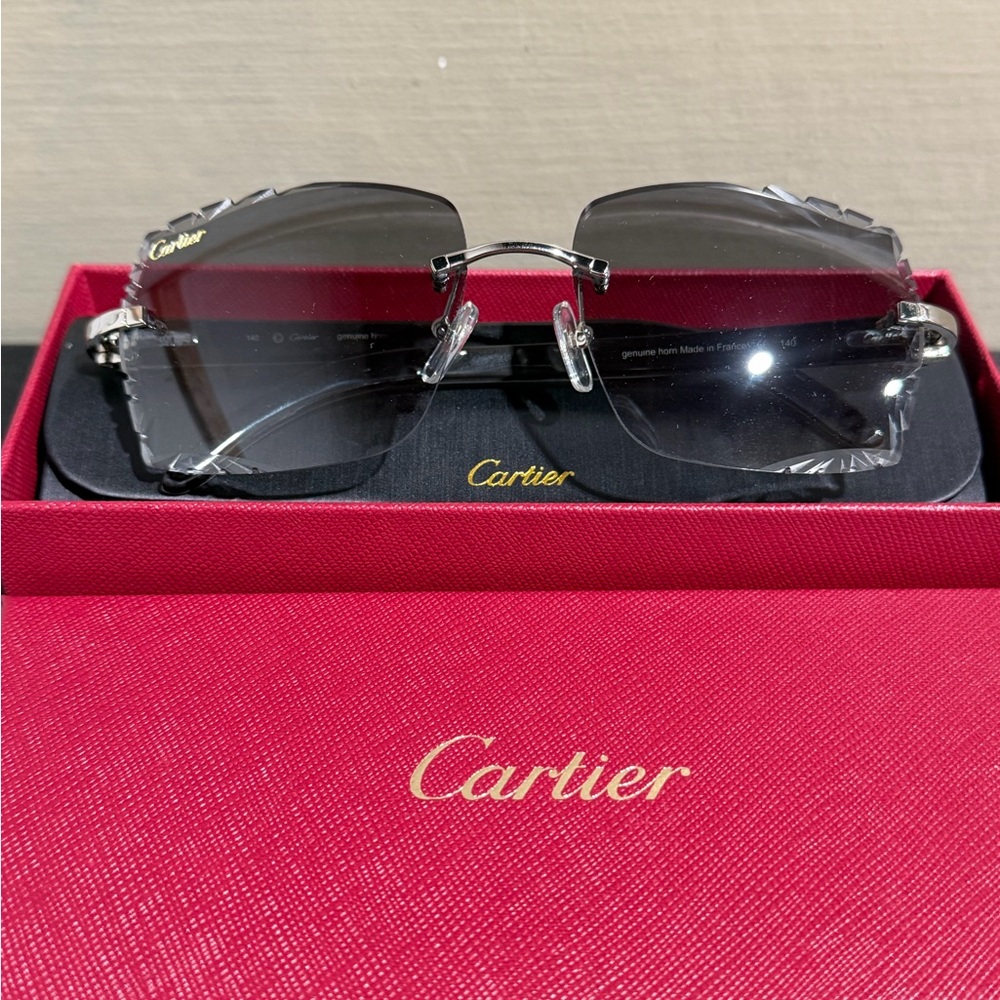 Cartier Men's Silver and Black Rimless Glasses